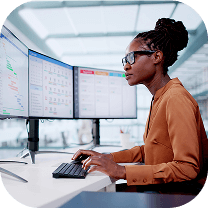 looking at a computer and phone